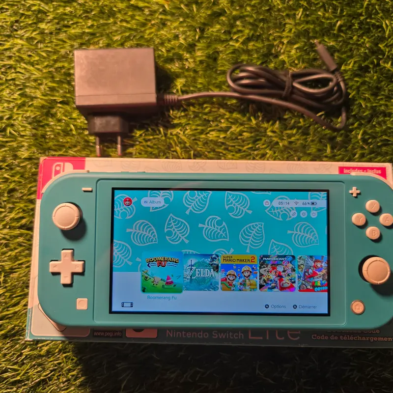 Switch Lite turquoise avec son chargeur