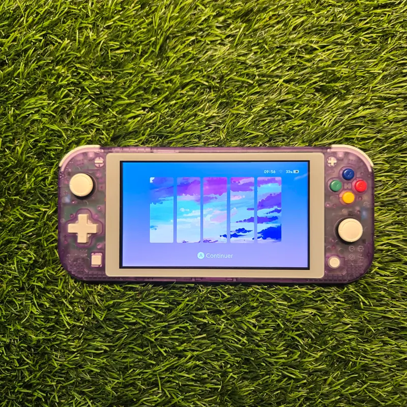 Switch Lite violette transparente avec câble de charge